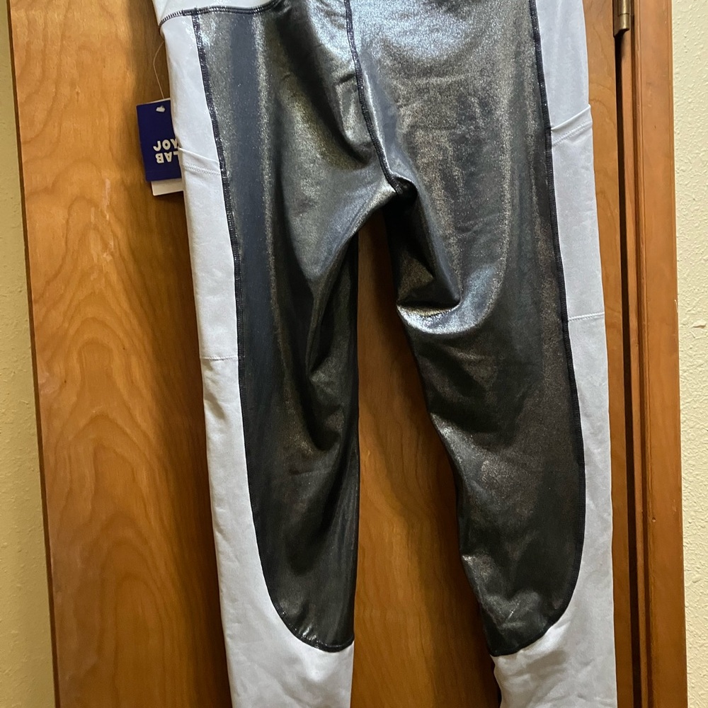 2 pairs of Metallic Silver and White Pants one XXL without tags and one XL with